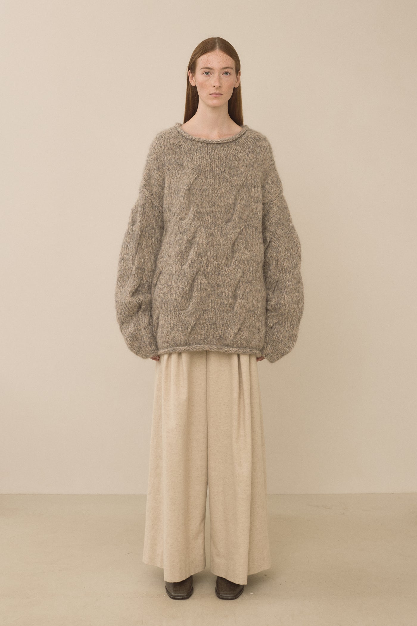 HANDKNIT CABLE ROLLNECK