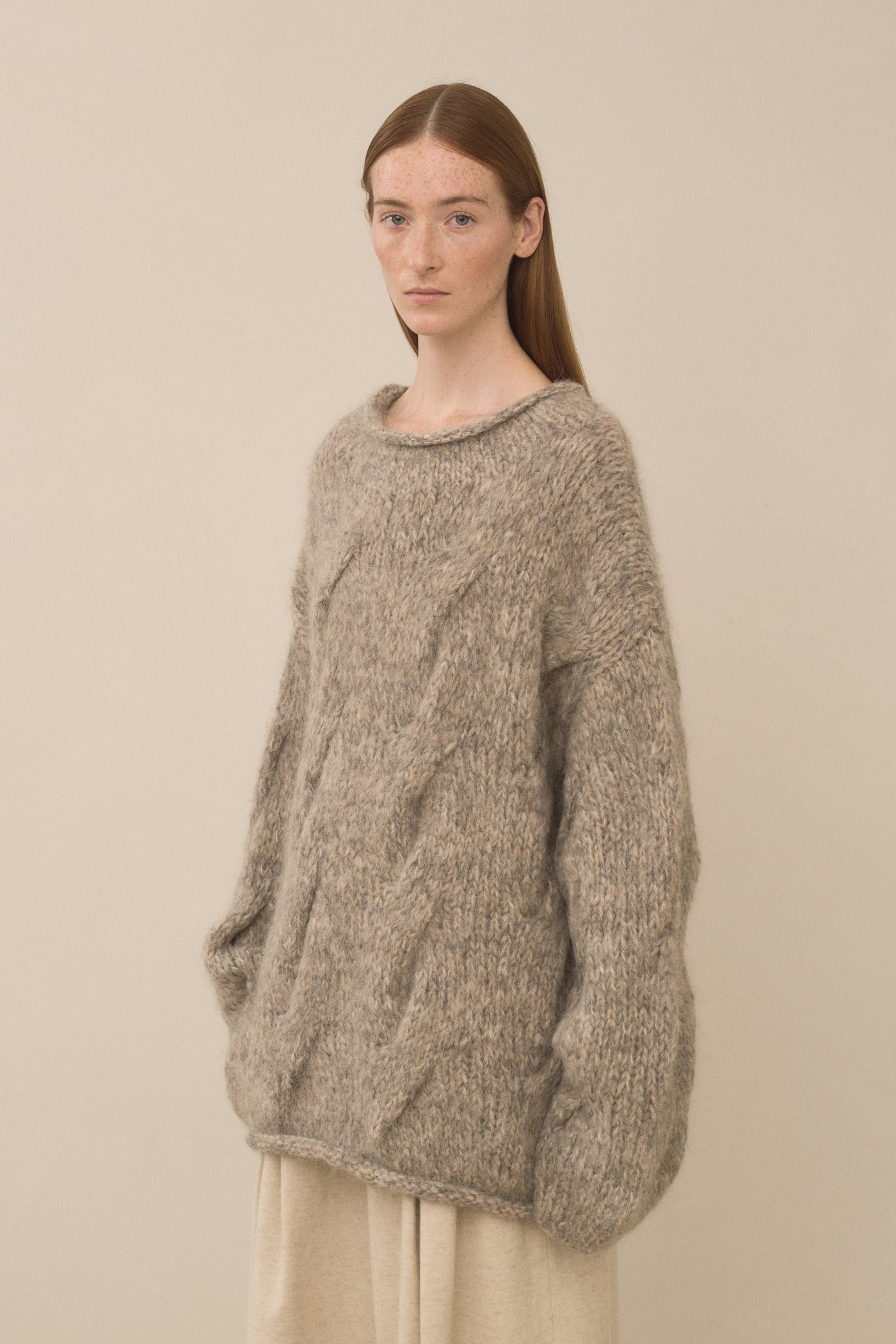 HANDKNIT CABLE ROLLNECK