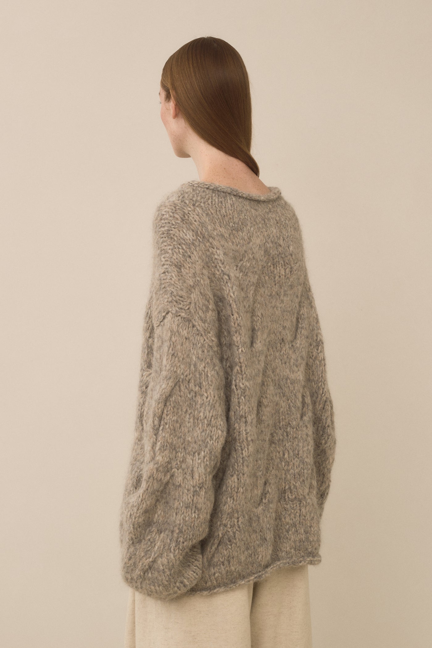 HANDKNIT CABLE ROLLNECK