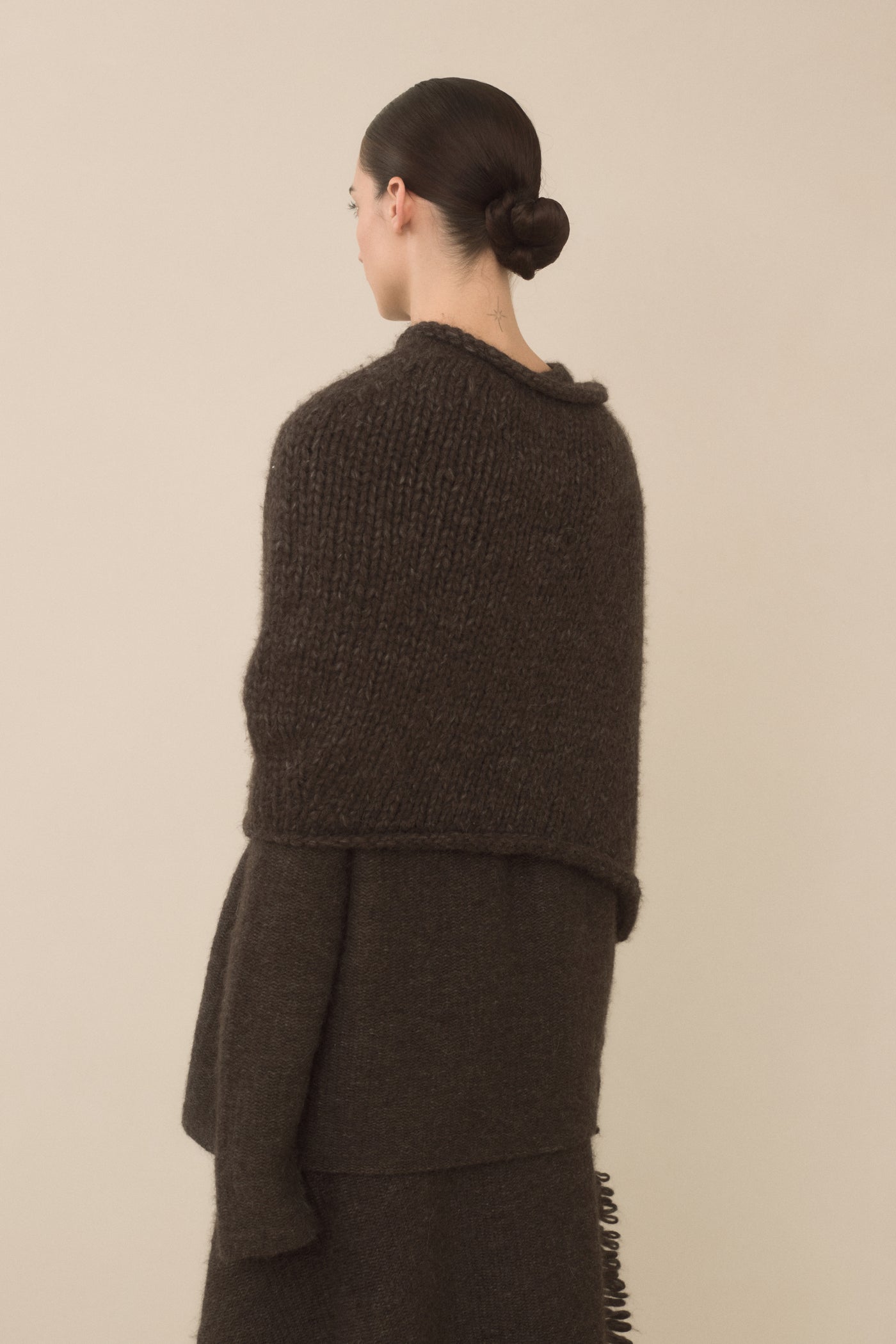 HANDKNIT ASKEW SHOULDERS